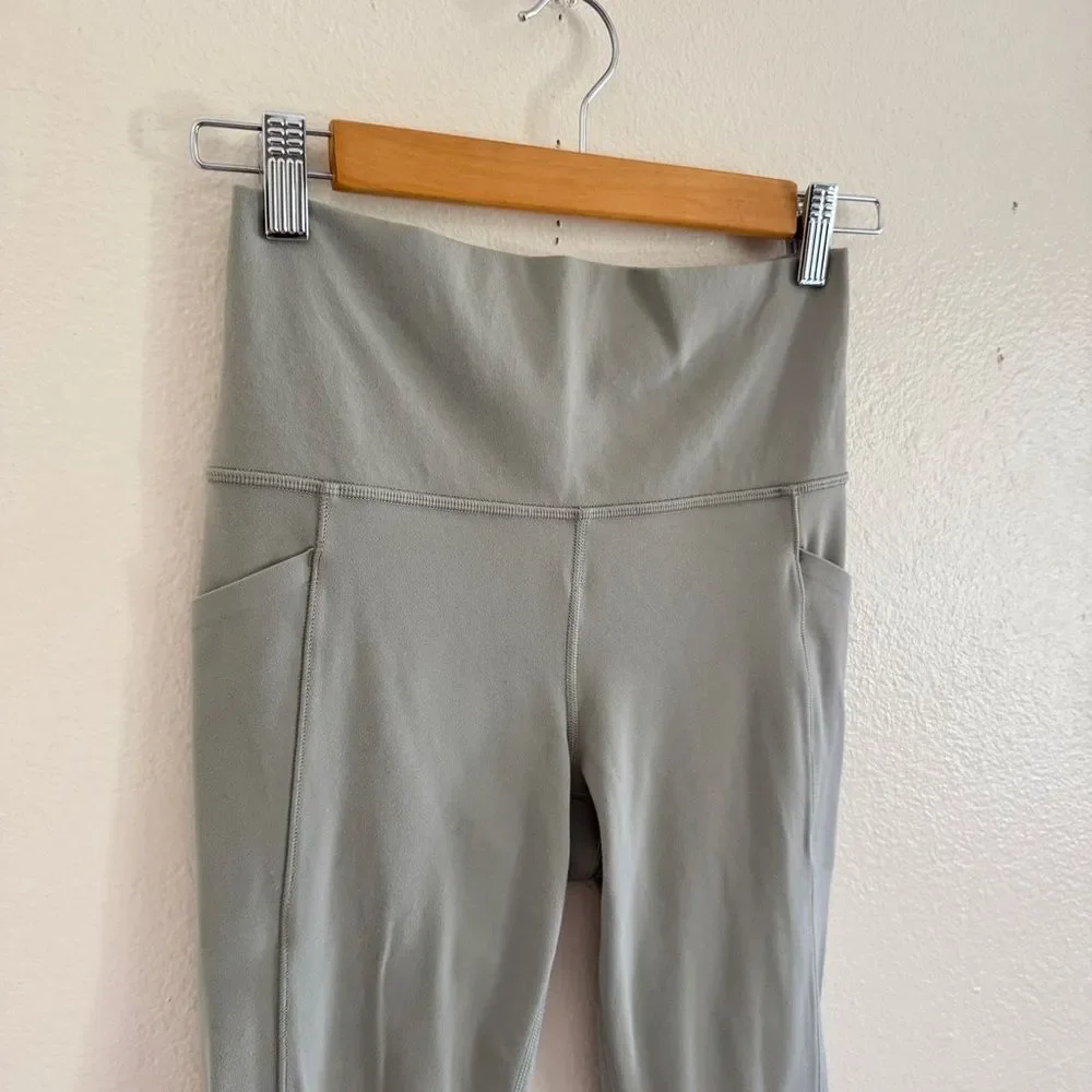 Athleta Salutation Stash Pocket II Cinch Legging Sage S